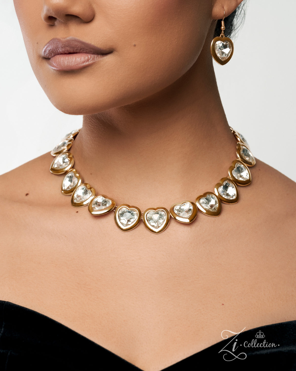 Enthusiast Paparazzi Zi Collection white heart-shaped gems in smooth gold frames - detail view 1