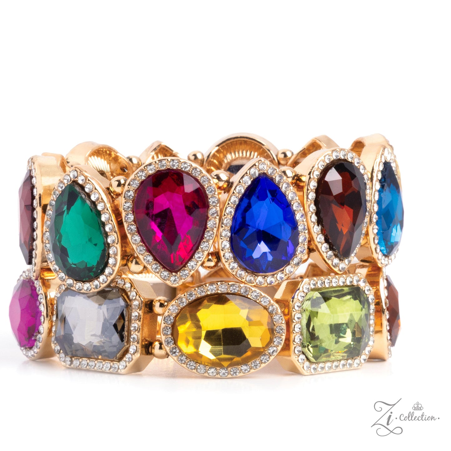 A wide gold-tone cuff bracelet featuring multiple colorful teardrop and rectangular gemstones in green, blue, pink, yellow, and gray, each surrounded by small clear rhinestones, shown on a white background.