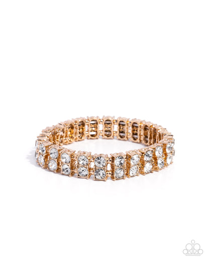 Rose gold bracelet with clear stones on a white background