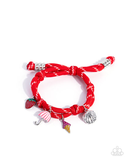 Red braided bracelet with various charms on a white background