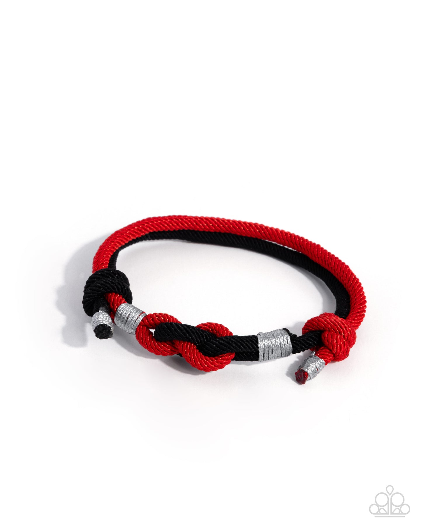 Bracelet with red, black, and silver braided design on a white background