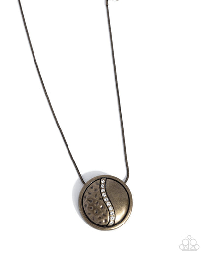 Necklace with a round pendant on a white background