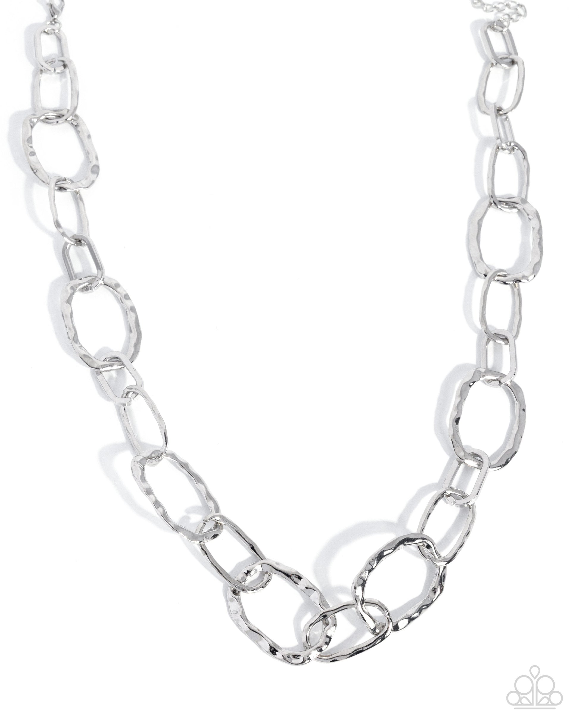 Silver chain necklace on a white background