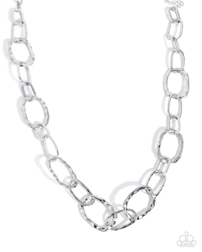 Silver chain necklace on a white background