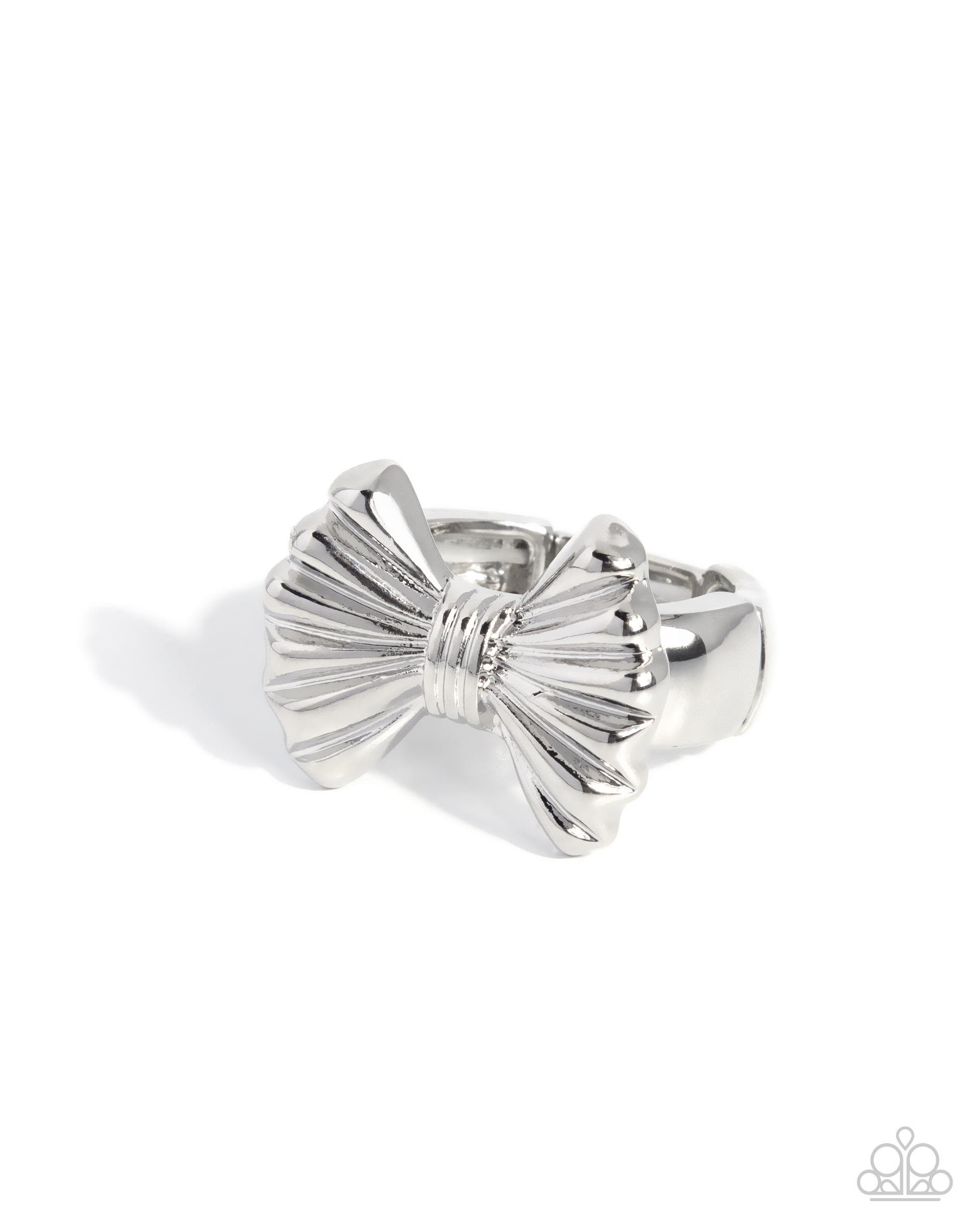 Silver bow-shaped ring on a white background