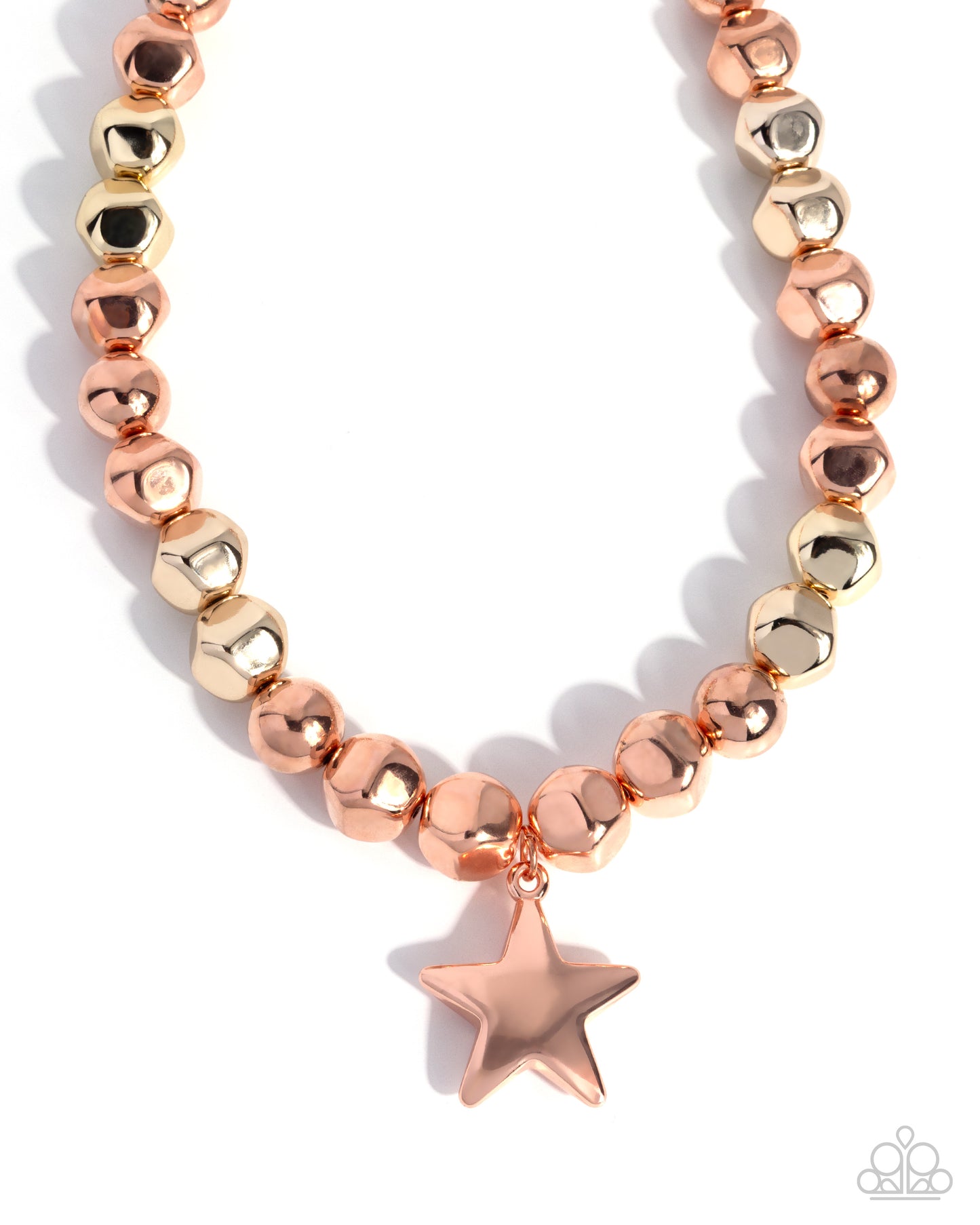 Necklace with rose gold star charm on a white background