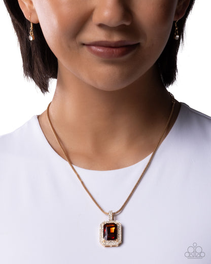 Woman wearing a necklace with a pendant on a white background