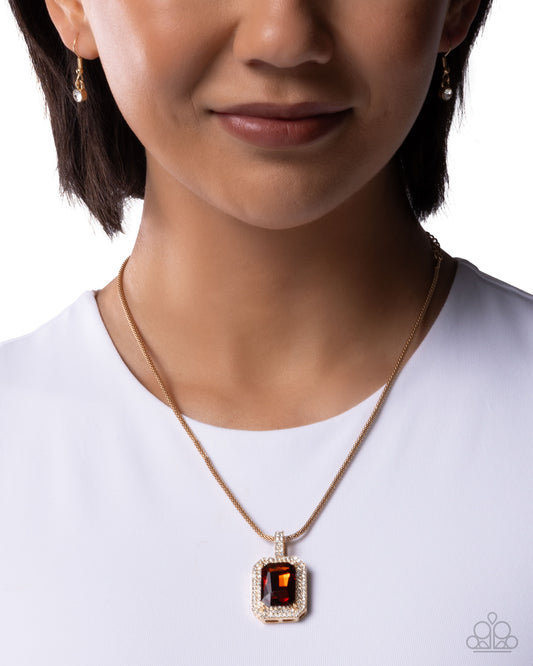 Woman wearing a necklace with a pendant on a white background