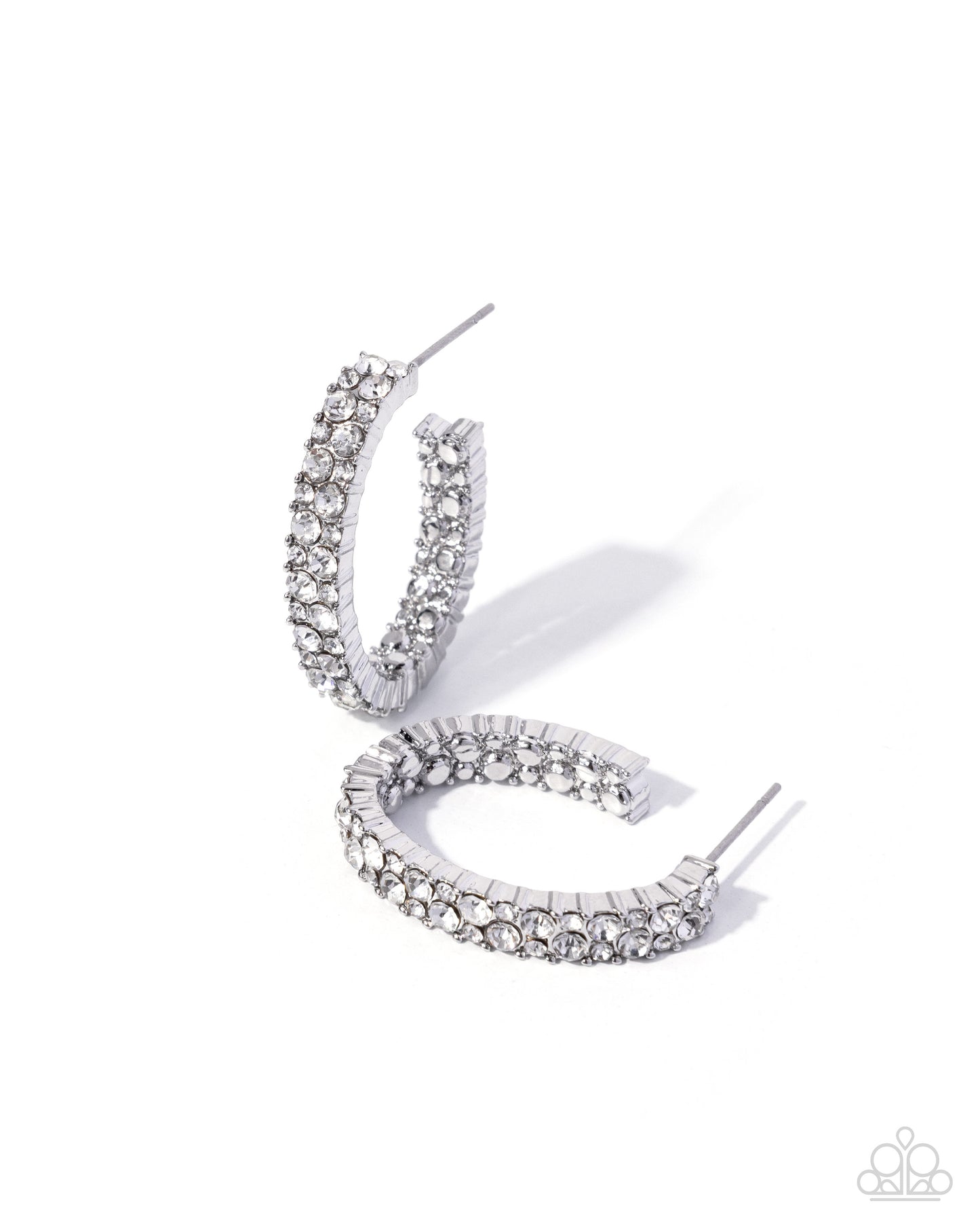 Silver hoop earrings with gemstones on a white background