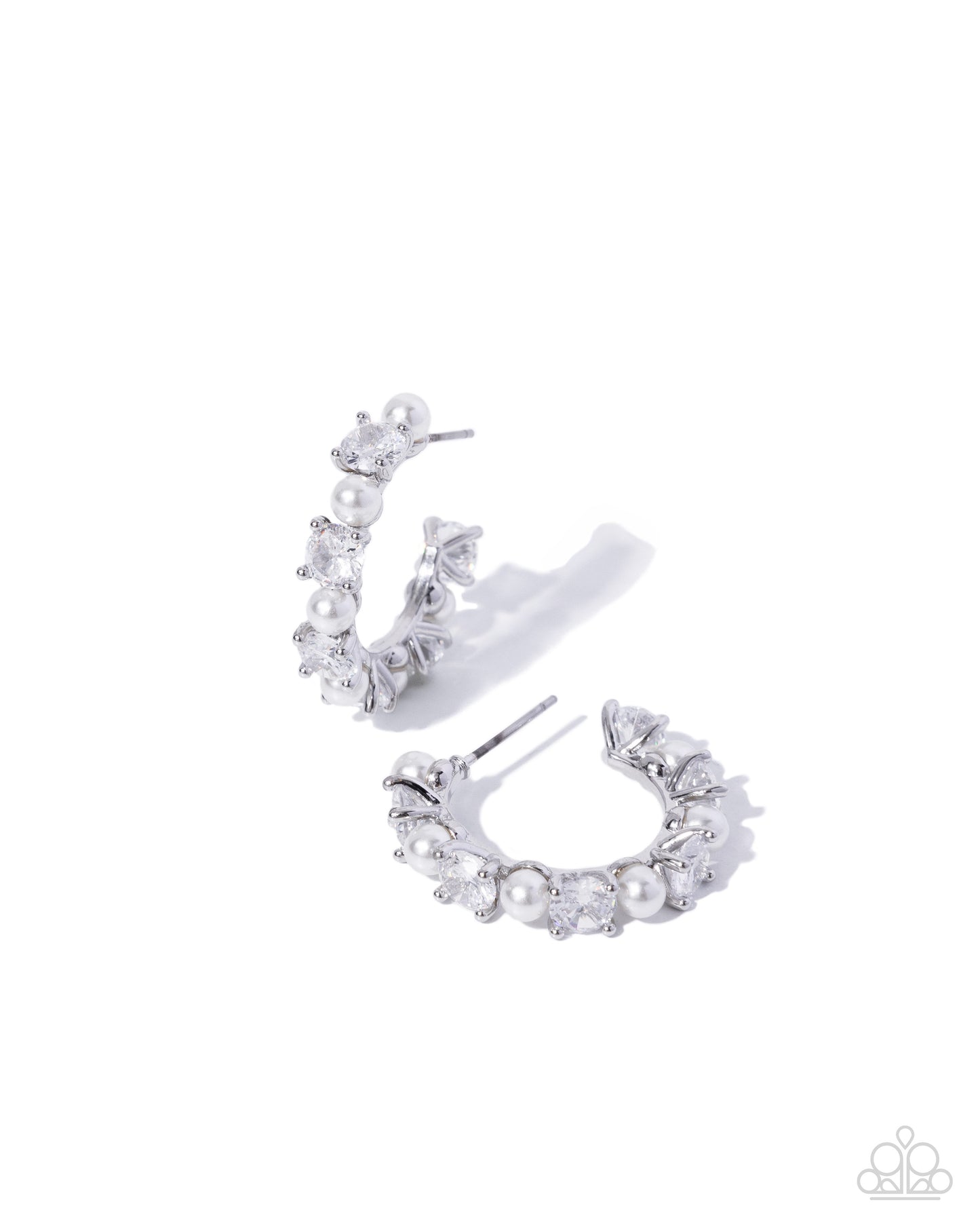 Silver crescent-shaped hoop earrings adorned with clear rhinestones and white faux pearls, displayed on a clean white background.