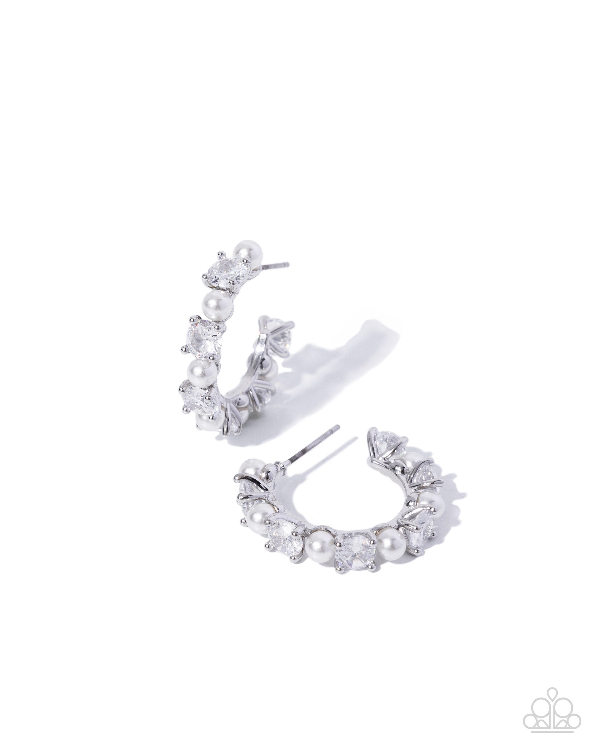 Silver crescent-shaped hoop earrings adorned with clear rhinestones and white faux pearls, displayed on a clean white background.