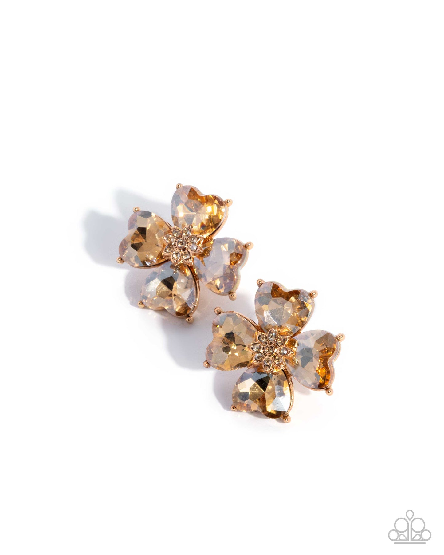 Pair of gold and crystal flower-shaped earrings on a white background
