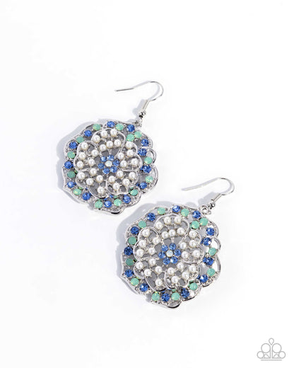 A pair of silver-tone dangle earrings with circular floral clusters of clear rhinestones, blue rhinestones, and mint green rhinestones, shown on a white background.