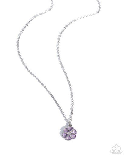 Silver necklace with a purple flower pendant on a white background