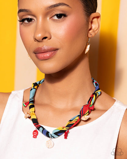 Woman wearing a colorful braided necklace against a yellow background
