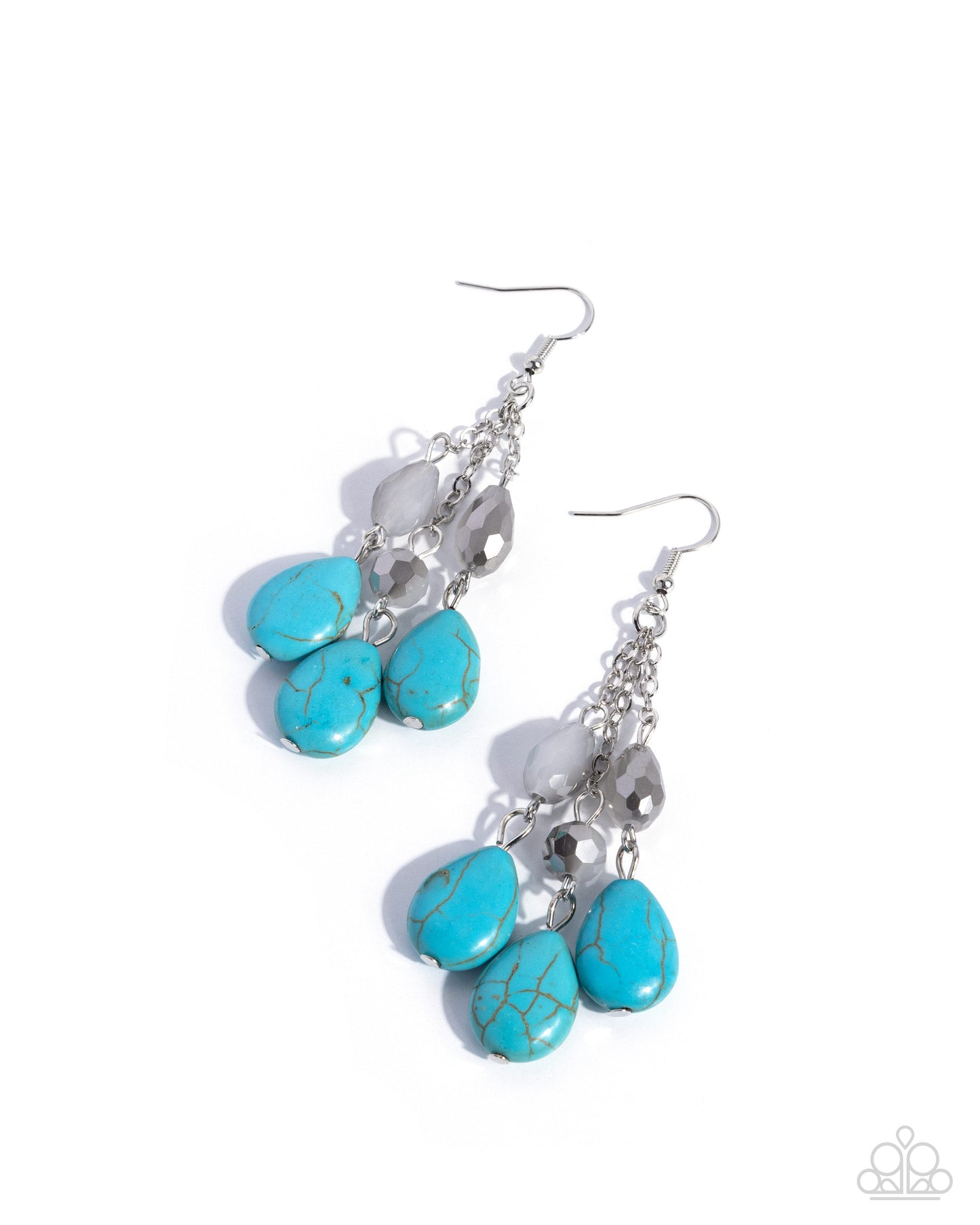Turquoise and silver earrings on a white background