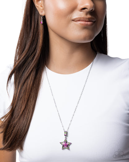 Close-up of Surreal Star fuchsia rhinestone pendant