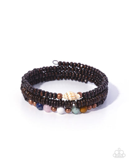 Multistrand beaded bracelet with various colored beads on a white background