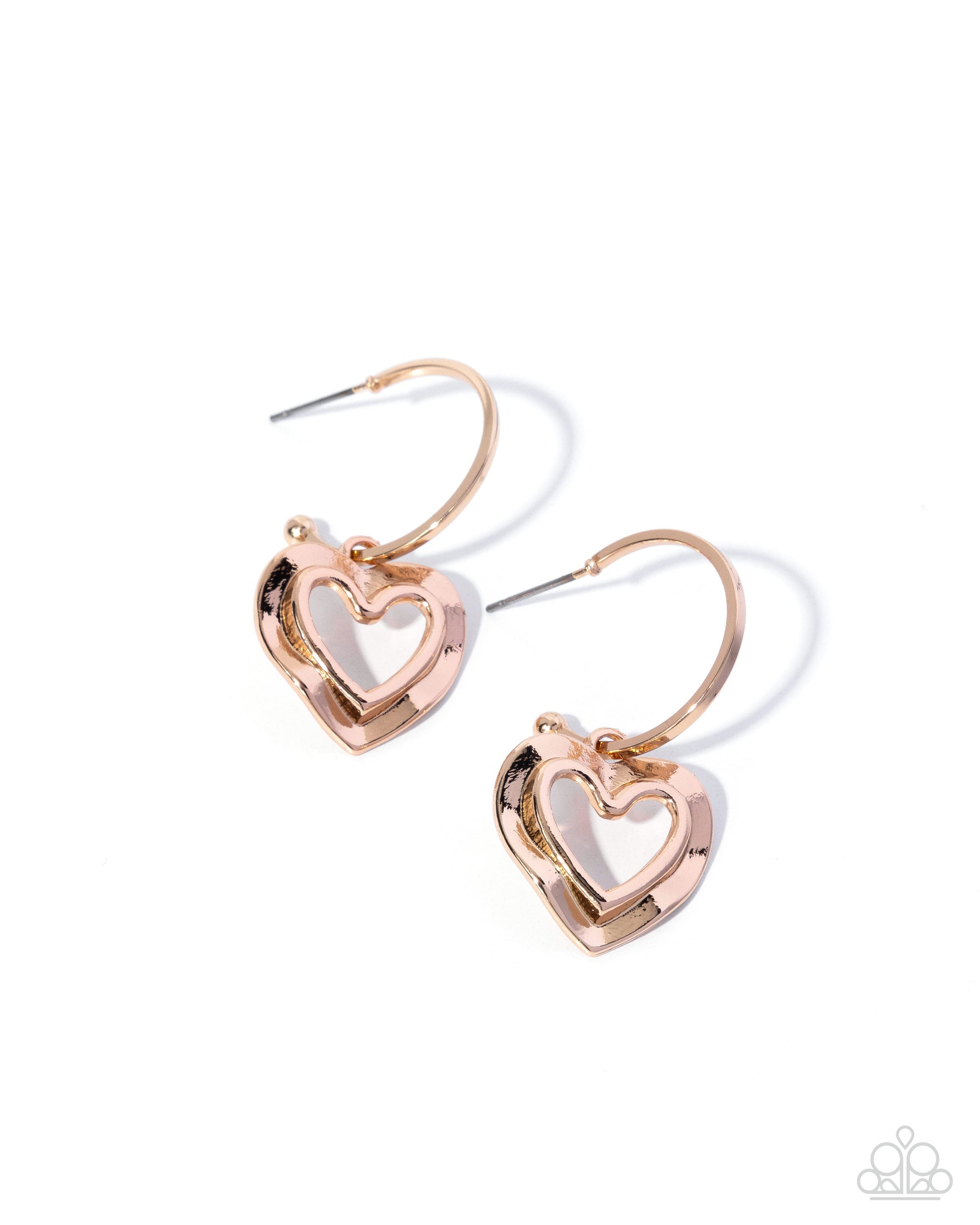 Rose gold heart-shaped earrings on a white background
