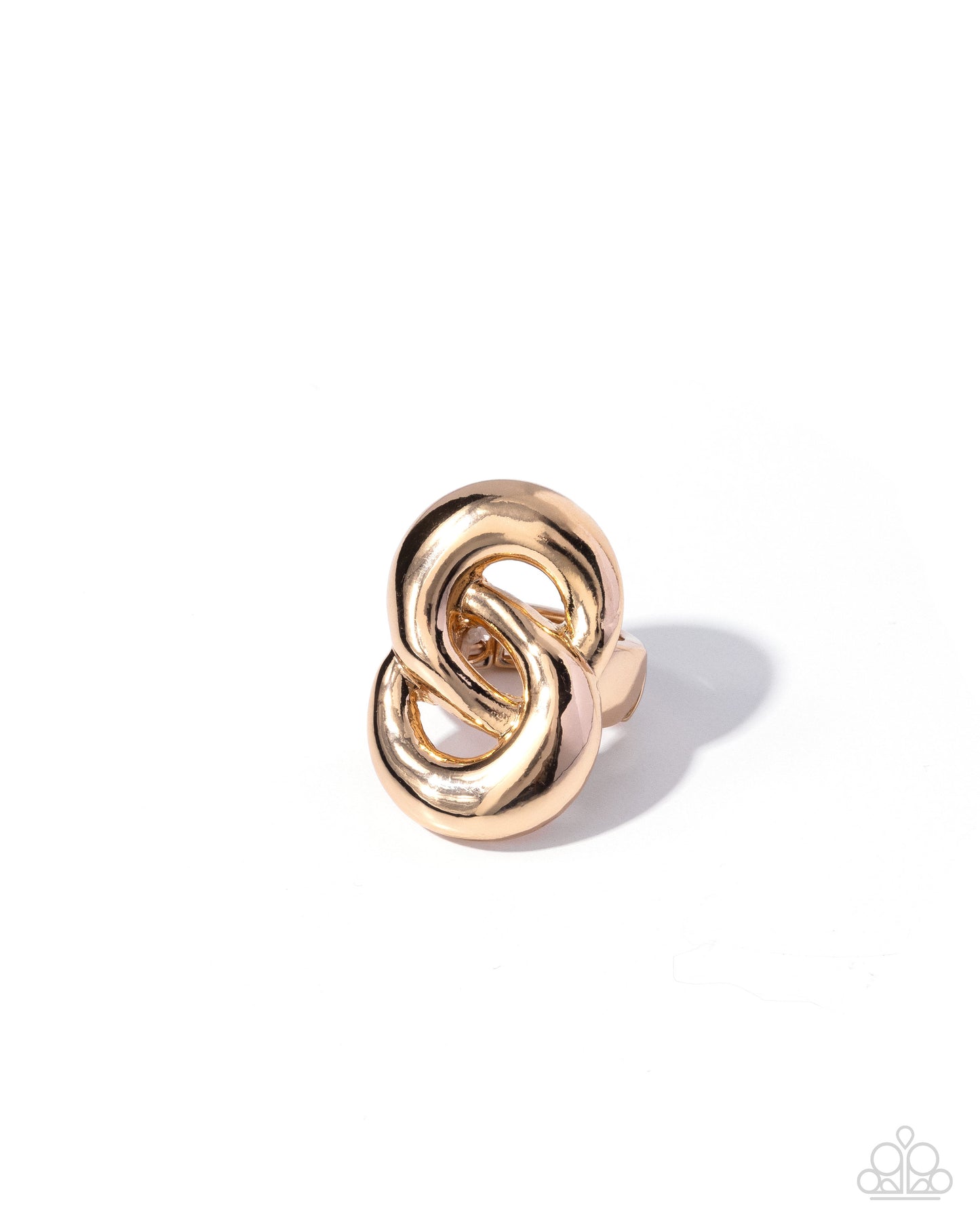Gold knot-shaped earring on a white background