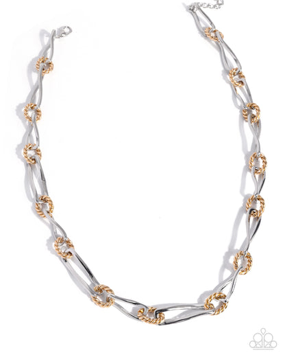 Necklace with white and gold links on a white background