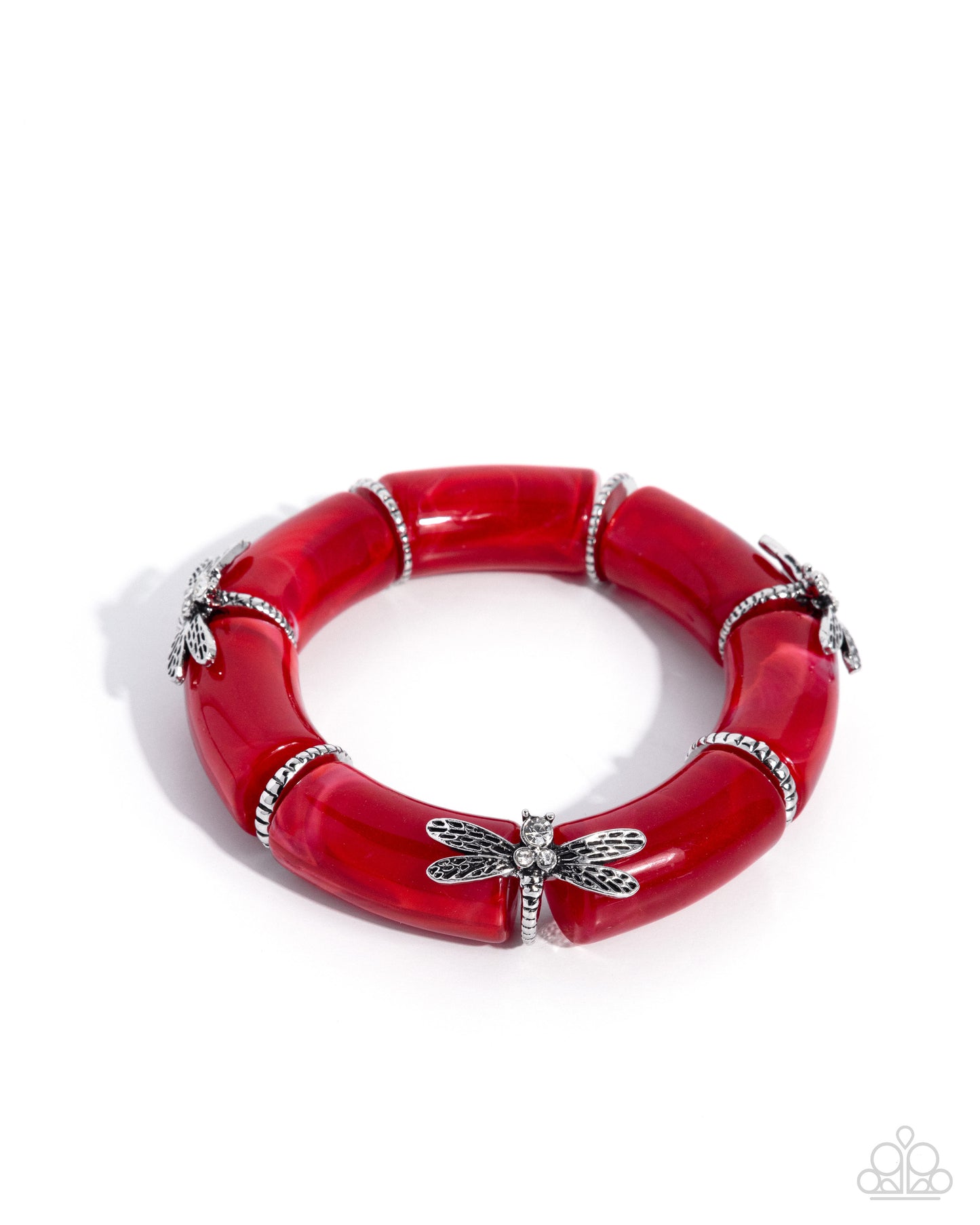 Red bracelet with silver dragonfly accents on a white background