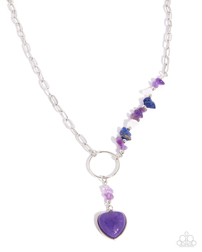 Necklace with purple heart pendant and multicolored beads on a white background