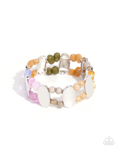Multicolored beaded bracelet on a white background