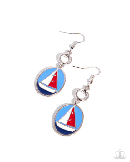 Sailboat-themed earrings on a white background
