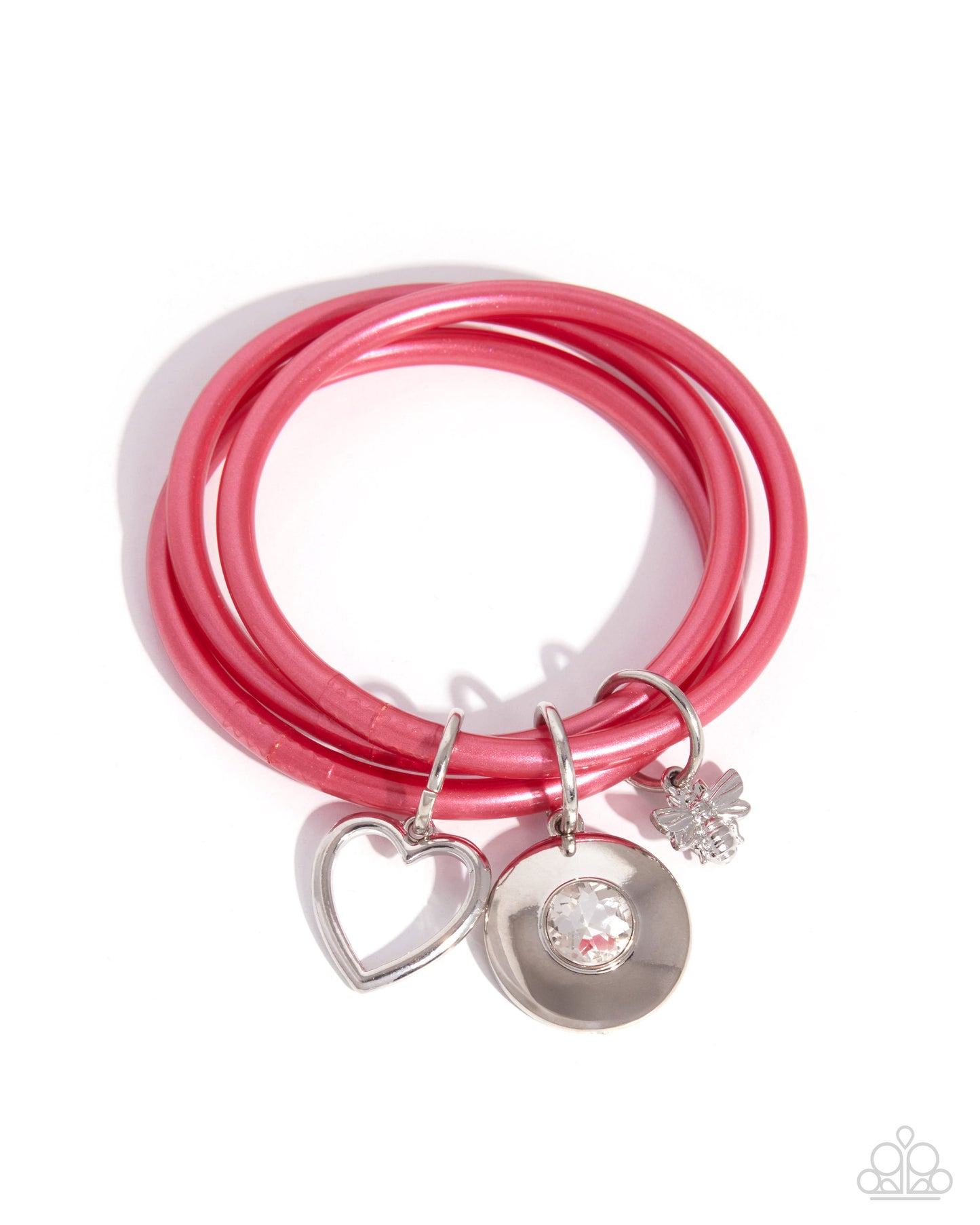 Pink cord with silver heart, round, and snowflake charms on a white background