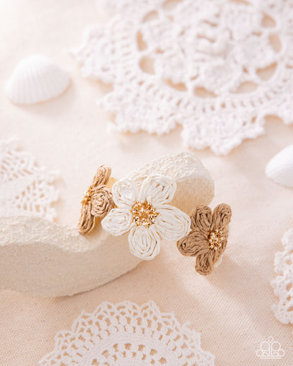 Decorative headband with flowers and butterflies on a lace background