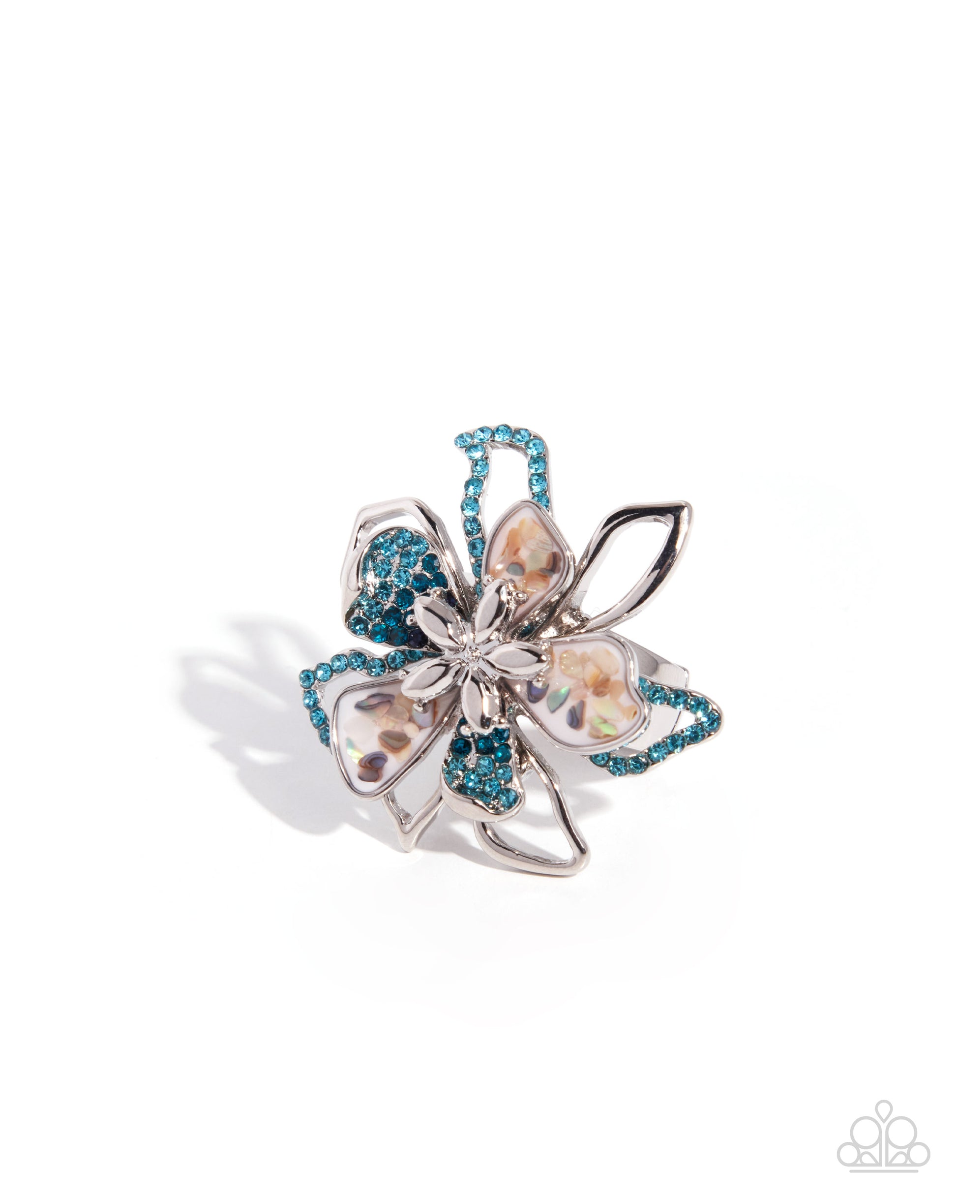 A silver-toned floral ring featuring iridescent pearl-like petals and turquoise blue rhinestone accents, photographed on a clean white background with a soft shadow.