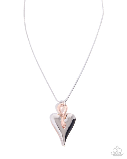 Necklace with a heart-shaped pendant on a white background