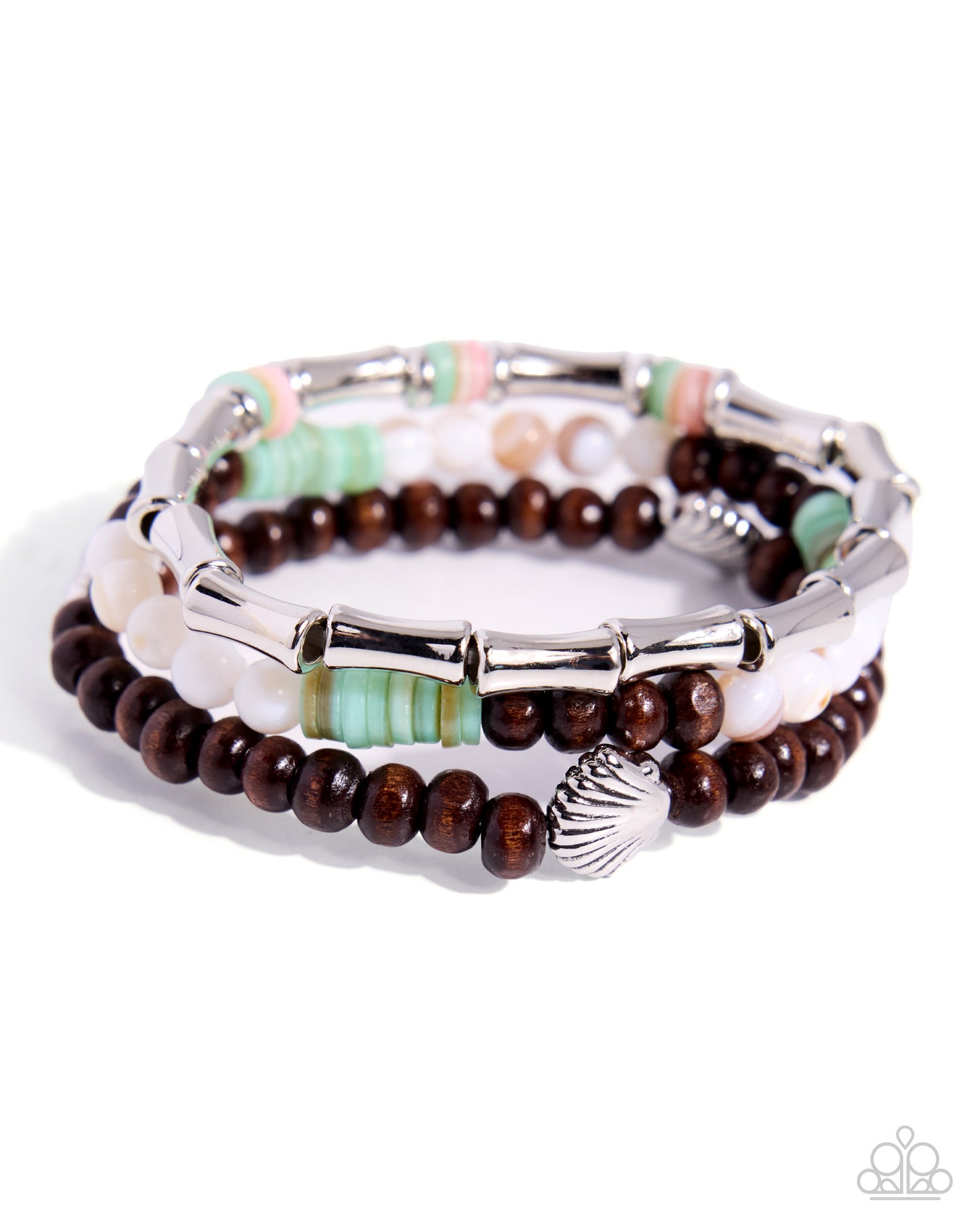 Stack of beaded bracelets with wooden and shell elements on a white background