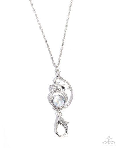 Silver necklace with a pendant on a white background