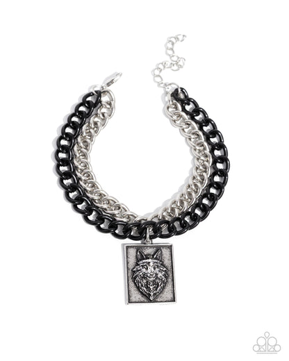 Necklace with black and silver chain design on a white background