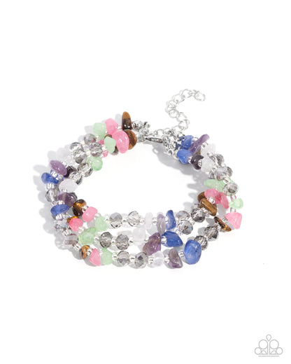 Multicolored beaded bracelet on a white background
