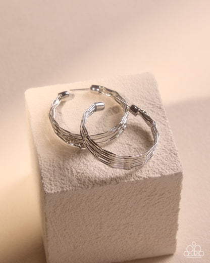 Real Radiance silver earrings modeled view