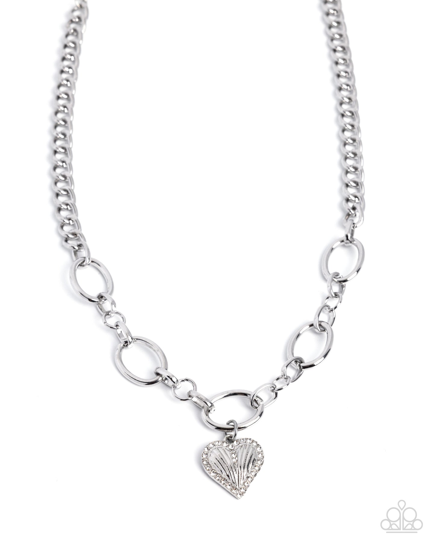 A silver-toned chain necklace featuring alternating oval and link-style segments, with a small heart-shaped charm at the center adorned with clear rhinestones. The necklace is displayed on a clean white background with a small Paparazzi logo watermark in the bottom right corner.