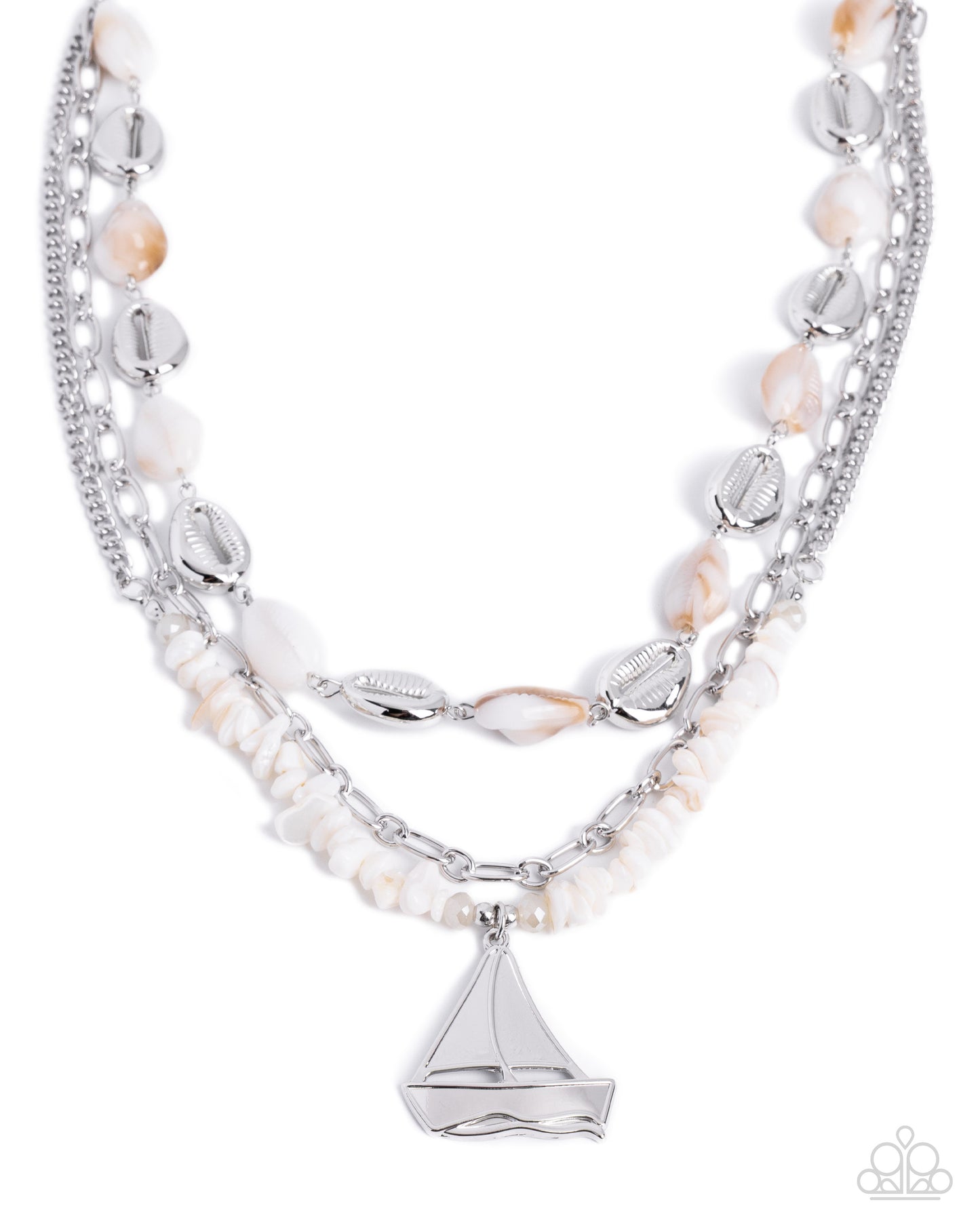 Multi-layered necklace with pearls and silver accents on a white background