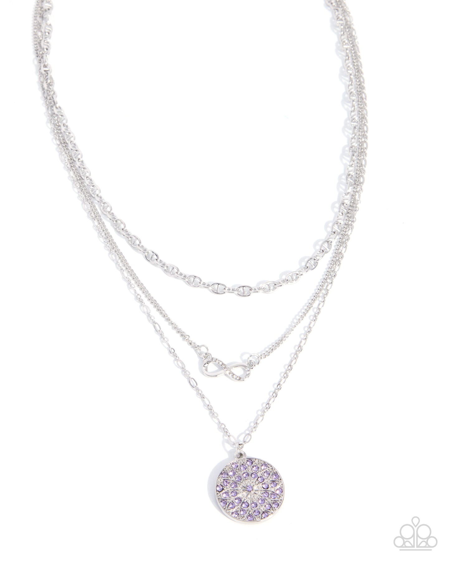 A silver-toned double-strand necklace featuring a round pendant adorned with light purple crystals, set against a plain white background.