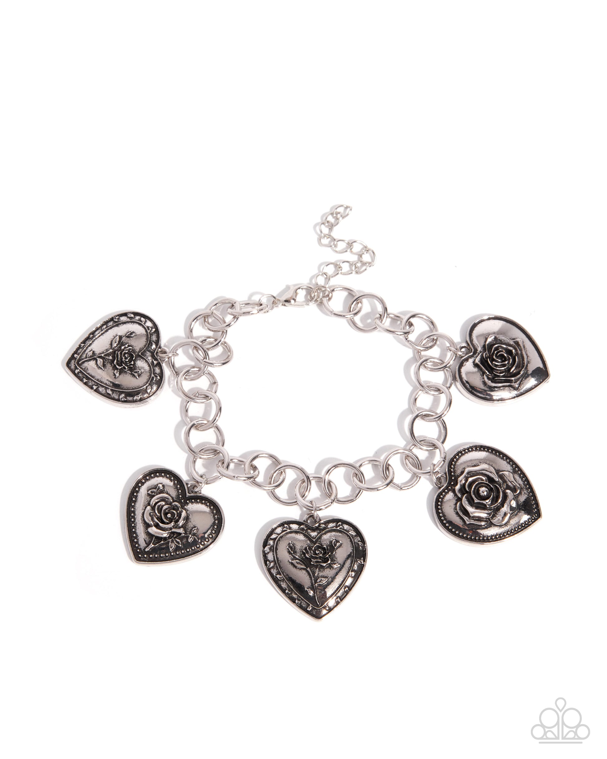 Silver bracelet with heart and rose-shaped charms on a white background