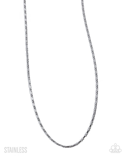 Silver chain necklace on a white background
