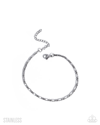 Silver chain bracelet on a white background