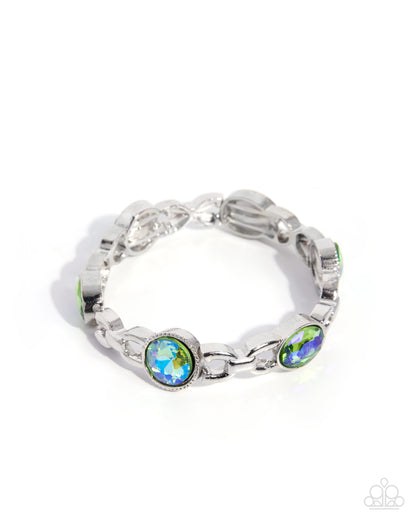 A silver chain bracelet with oval green and blue iridescent cabochon gemstones, shown on a clean white background.