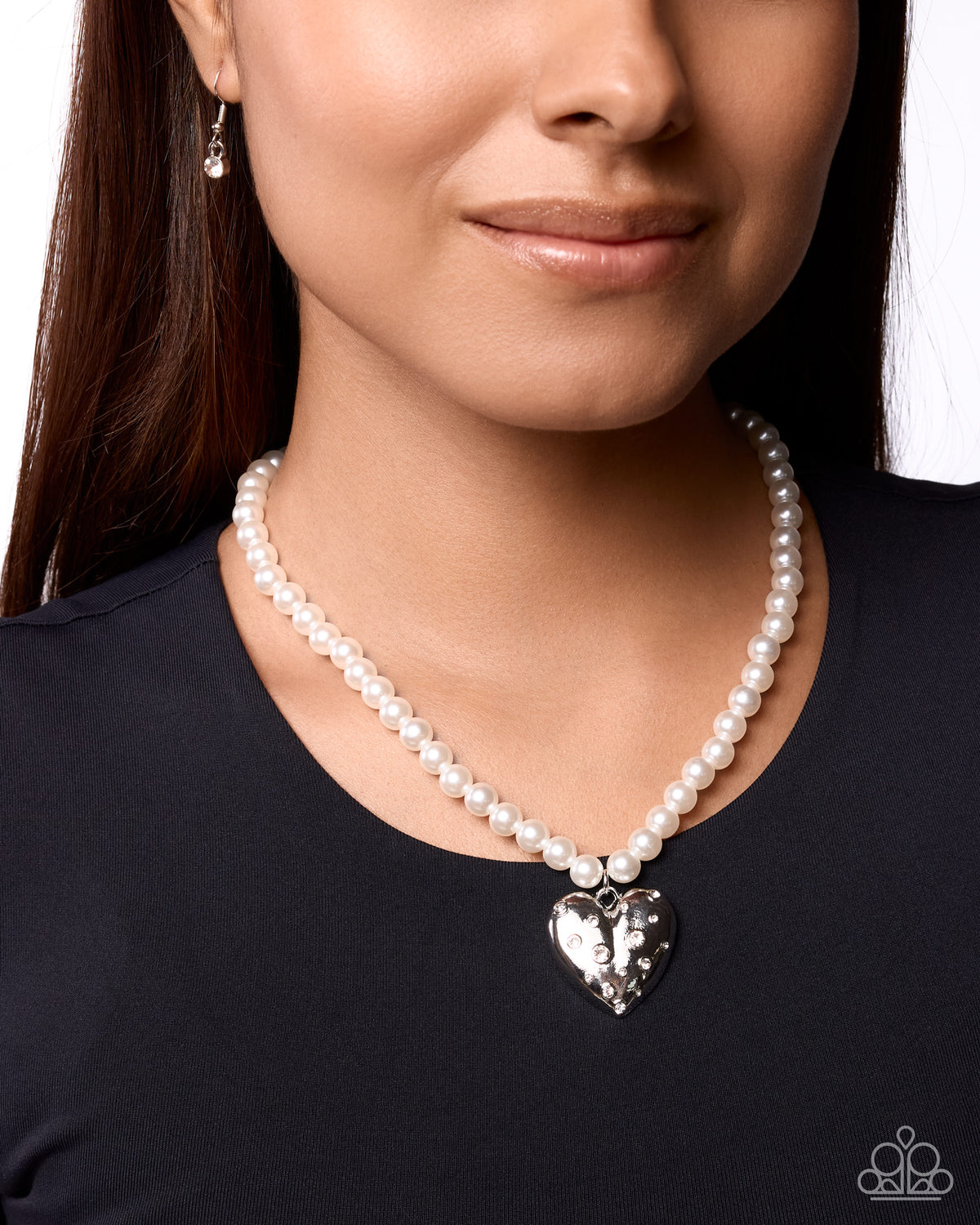 Close-up of Charming Cadence rhinestone heart pendant