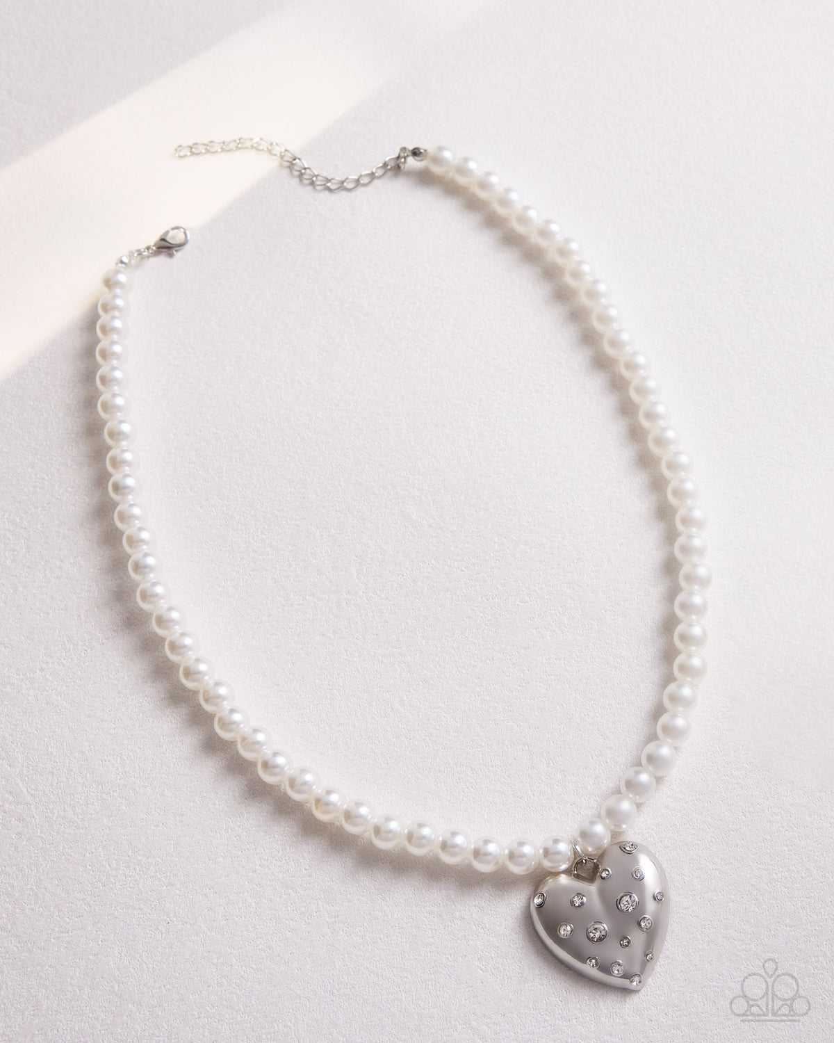 Full view of Charming Cadence white necklace and earrings