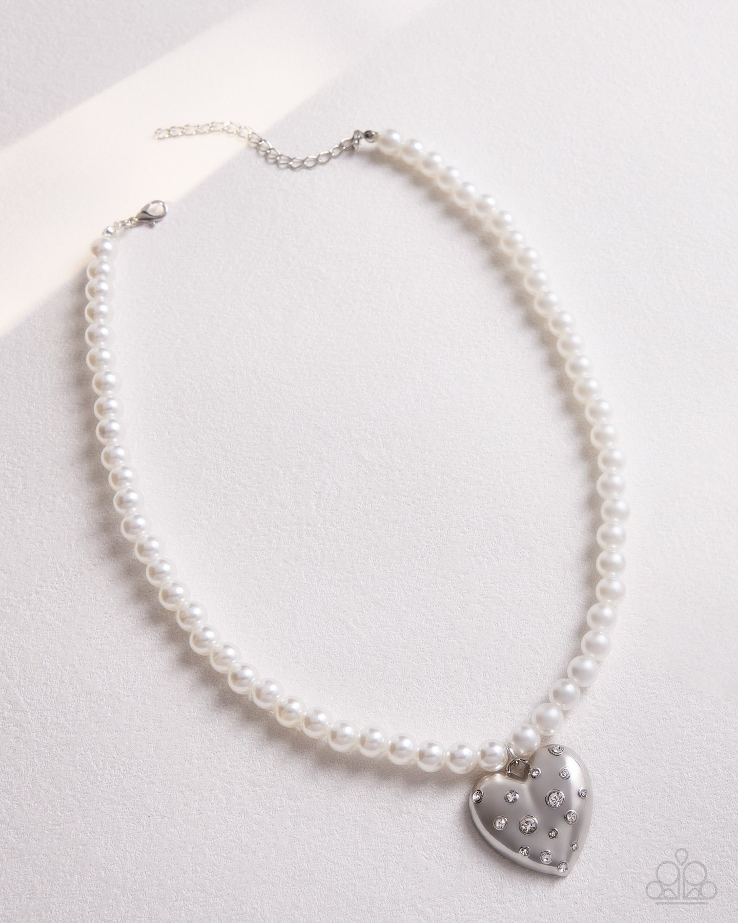 Full view of Charming Cadence white necklace and earrings