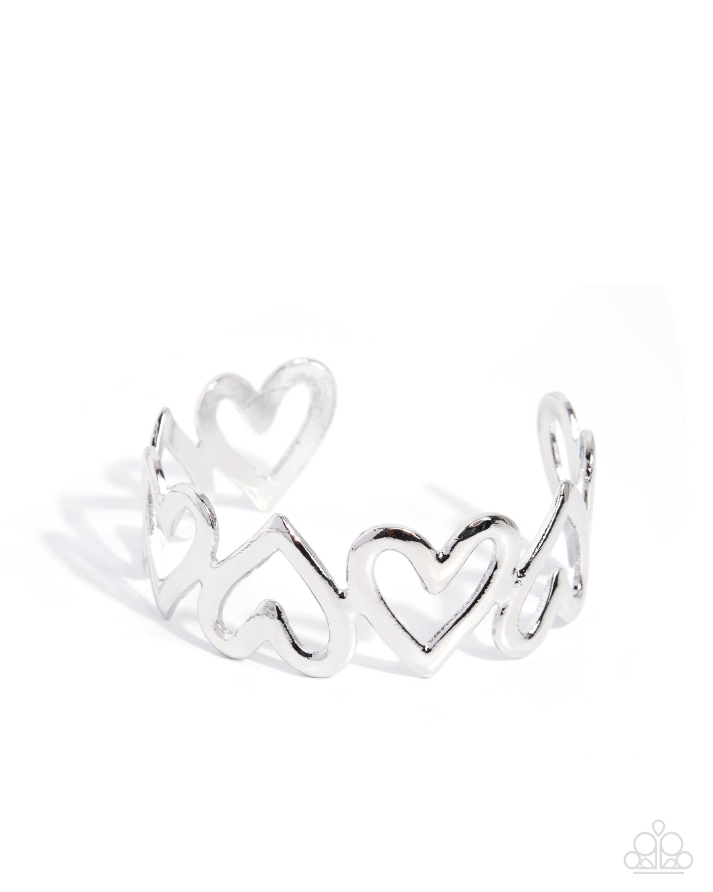 A silver open cuff ring featuring a continuous pattern of interlocking hearts, photographed on a clean white background with a soft shadow.