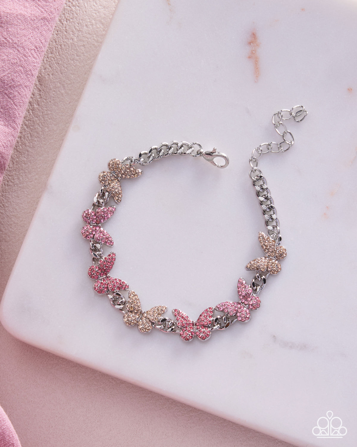 Model wearing Bustling Butterflies pink butterfly bracelet